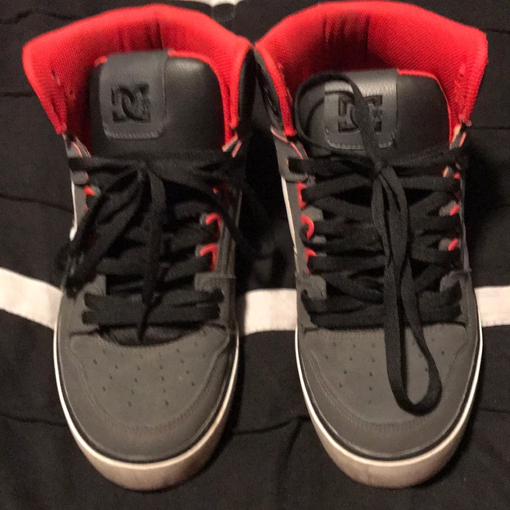 DC high top tennis shoes.